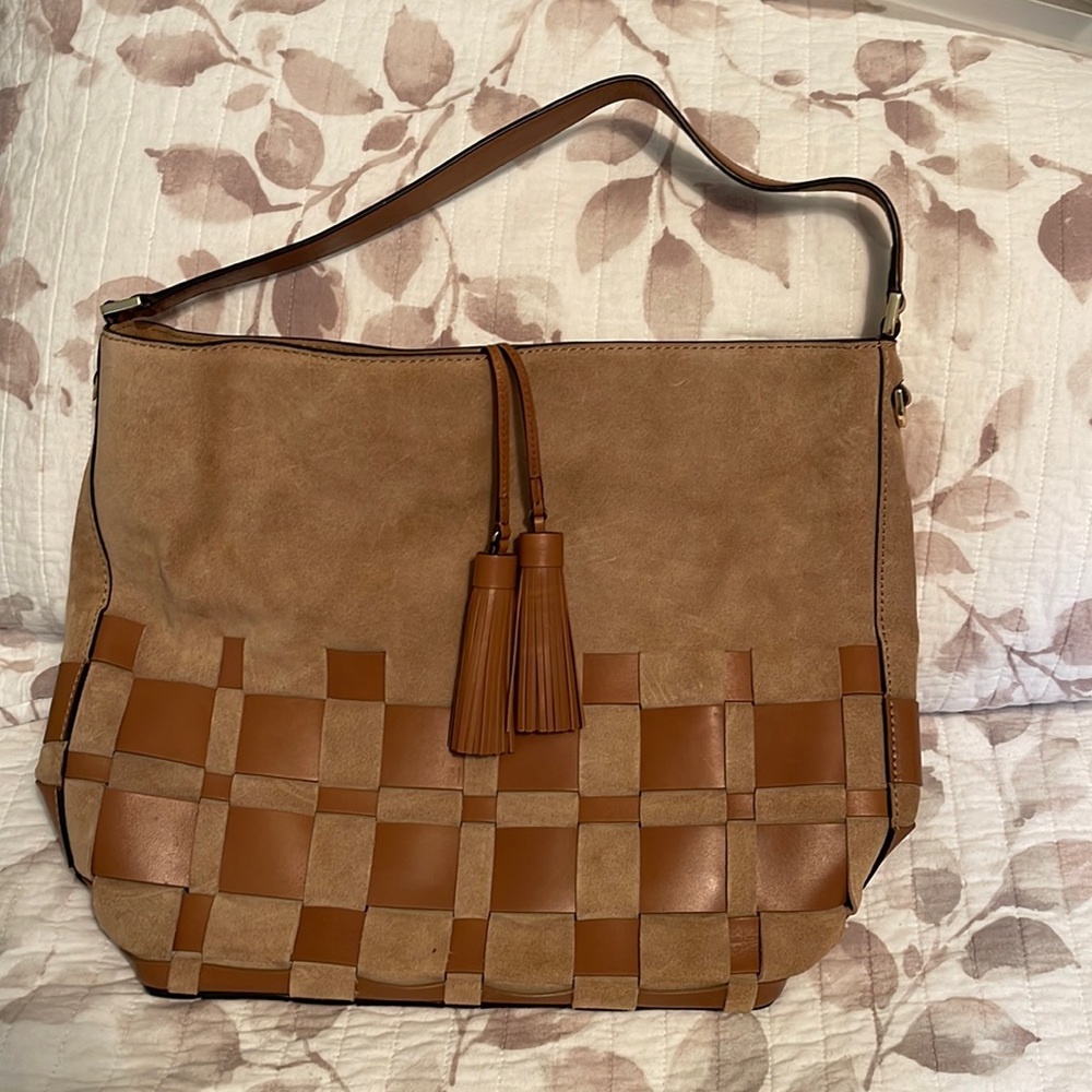 MAKE AN OFFER. 
Medium Michael Kors handbag with tassels